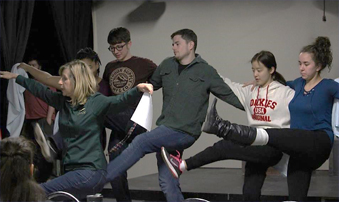 Cast and crew rehearsing for You're a Good Man Charlie Brown