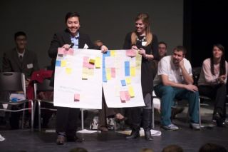 Students holding posters