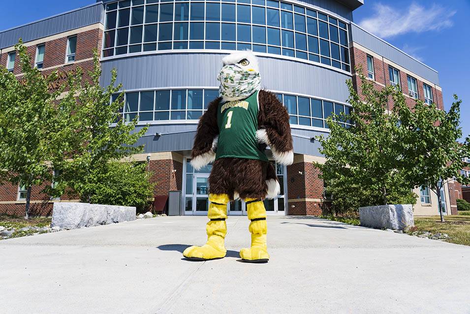 Baldwin standing in front of the O'Donnell Commons