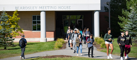 Students walk out of the Beardsley Meeting house