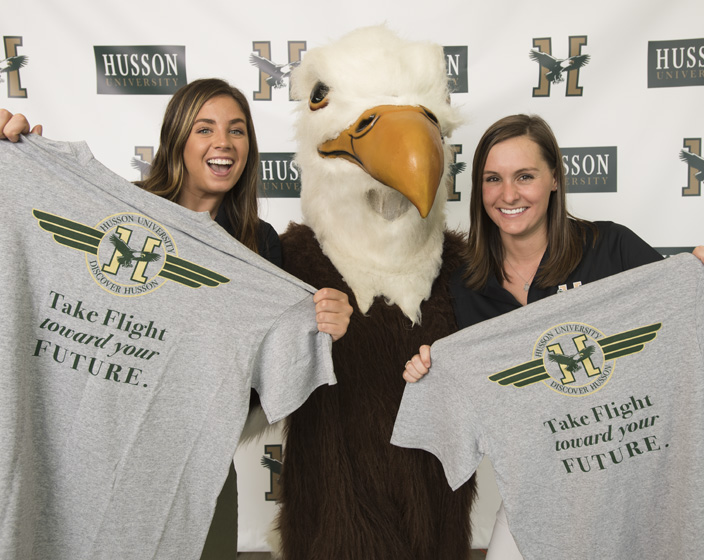 Students pose with Baldwyn at Discover Husson day