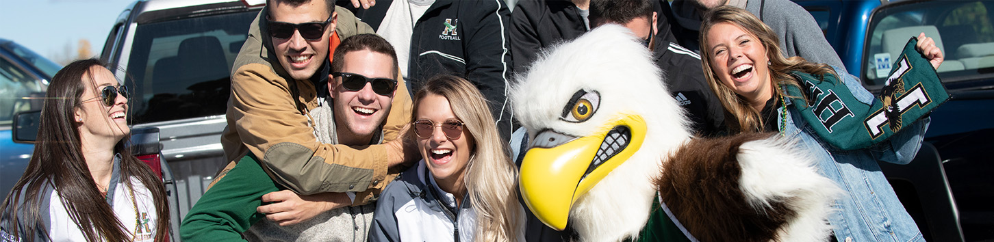 Students join Baldwin on the campus of Husson University