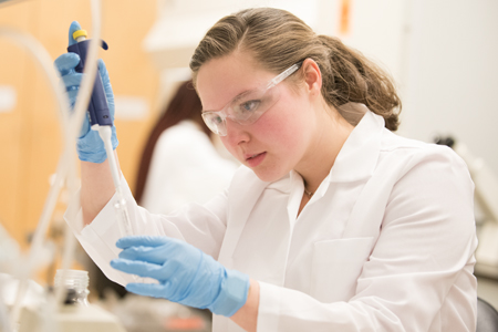 Pharmacy student working in chemistry lab