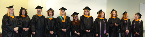 A group of recently hooded Husson MSN students