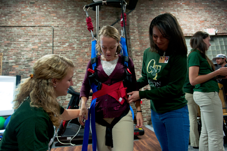 physical therapy students work in a muscle lab
