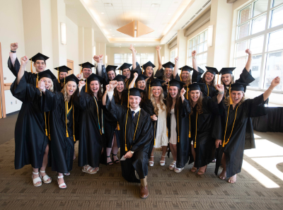 Masked students at graduation