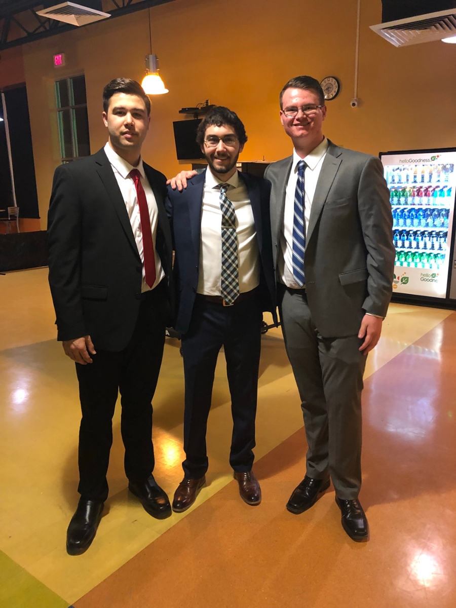 Chasse and his friends during a Meet the Candidates night for Student Government