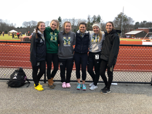 Allison and some teammates near the track