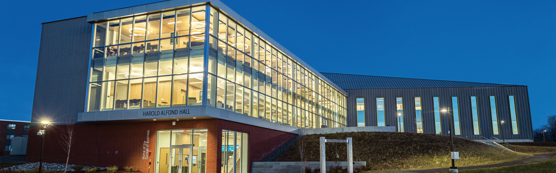 Exterior of Harold Alfond Hall at night