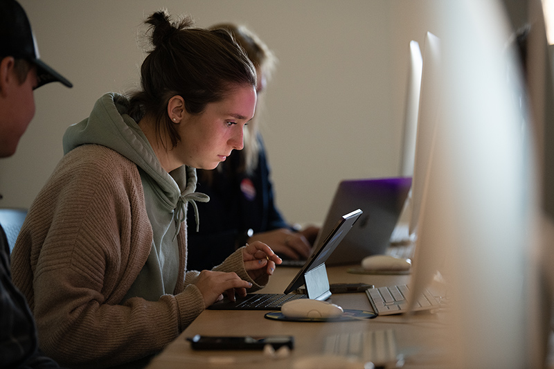 A student works in a computer lab