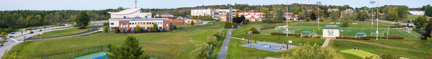 students walking on campus at Husson University