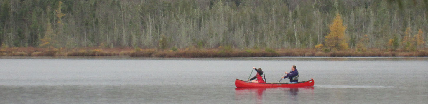 Students in a canoe on a lake