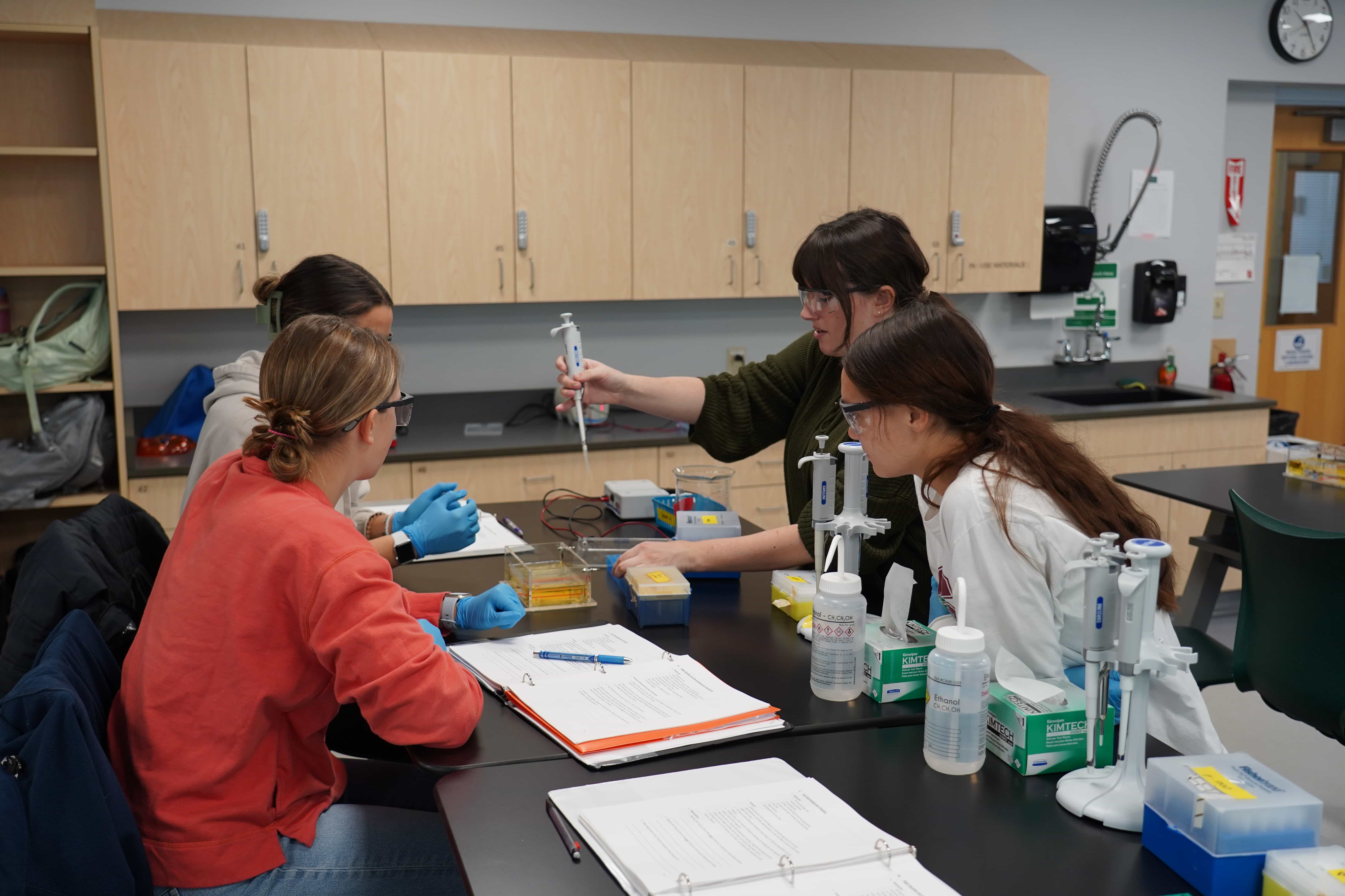 A group of students working in a lab.