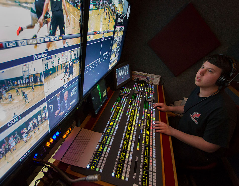 student working in the live production trailer
