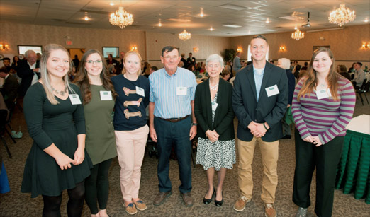 Joseph H. Cyr, President/Owner of Cyr Bus Lines and his wife Suzanne (Sue), with scholarship recipients
