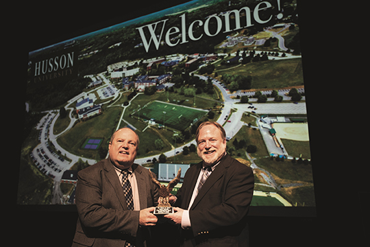 President of Husson University Dr Robert Clark poses with Executive Director of Communications, Eric Gordon