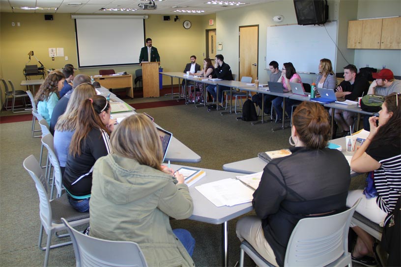 Students attend class at Husson University