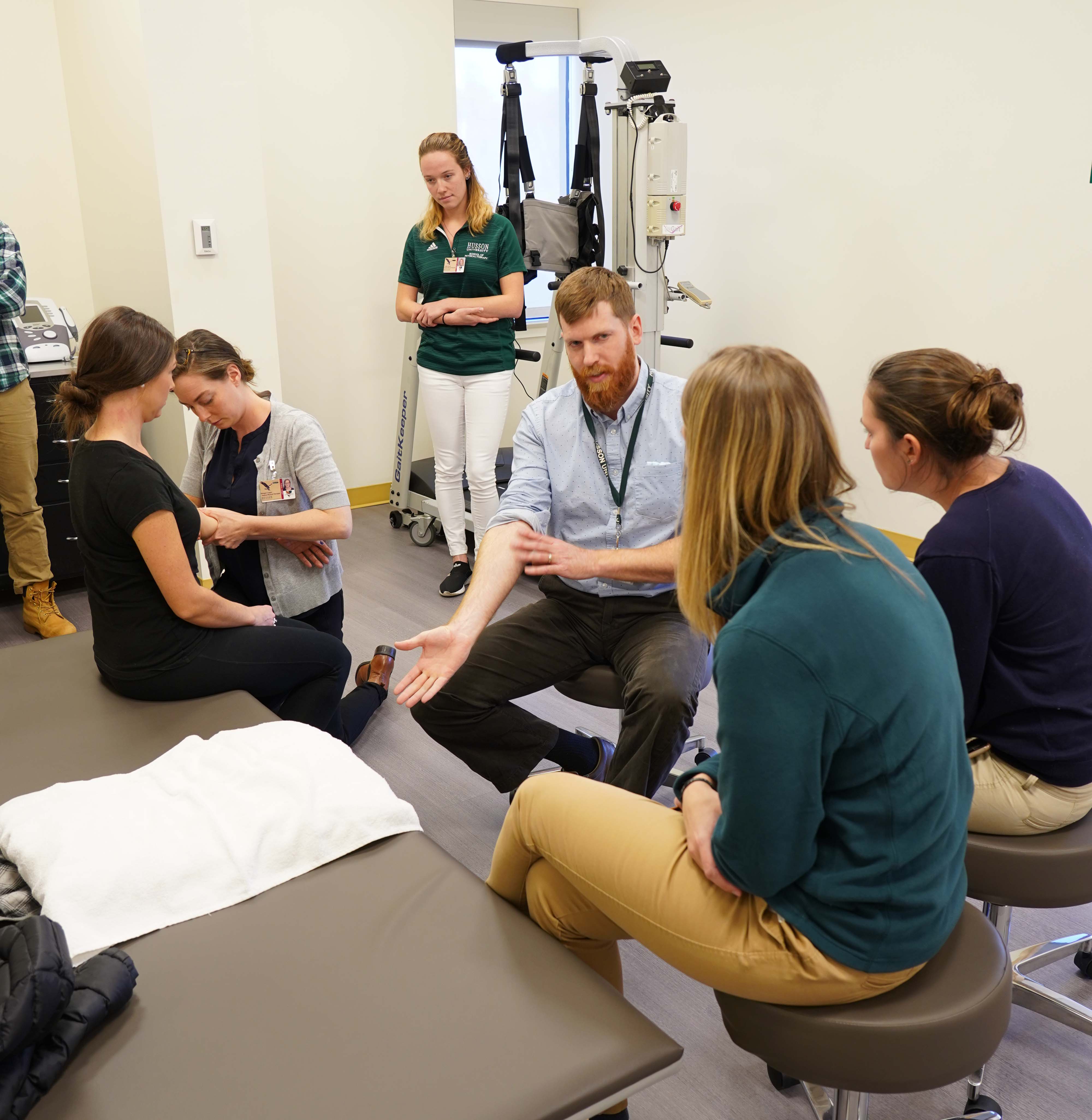 Physical Therapy faculty and students work in the Soaring Eagles Healthcare Pro-Bono Clinic