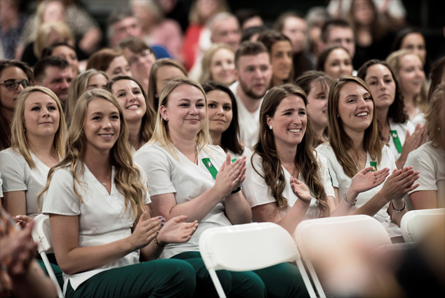 New graduates attend the nurses pinning ceremony