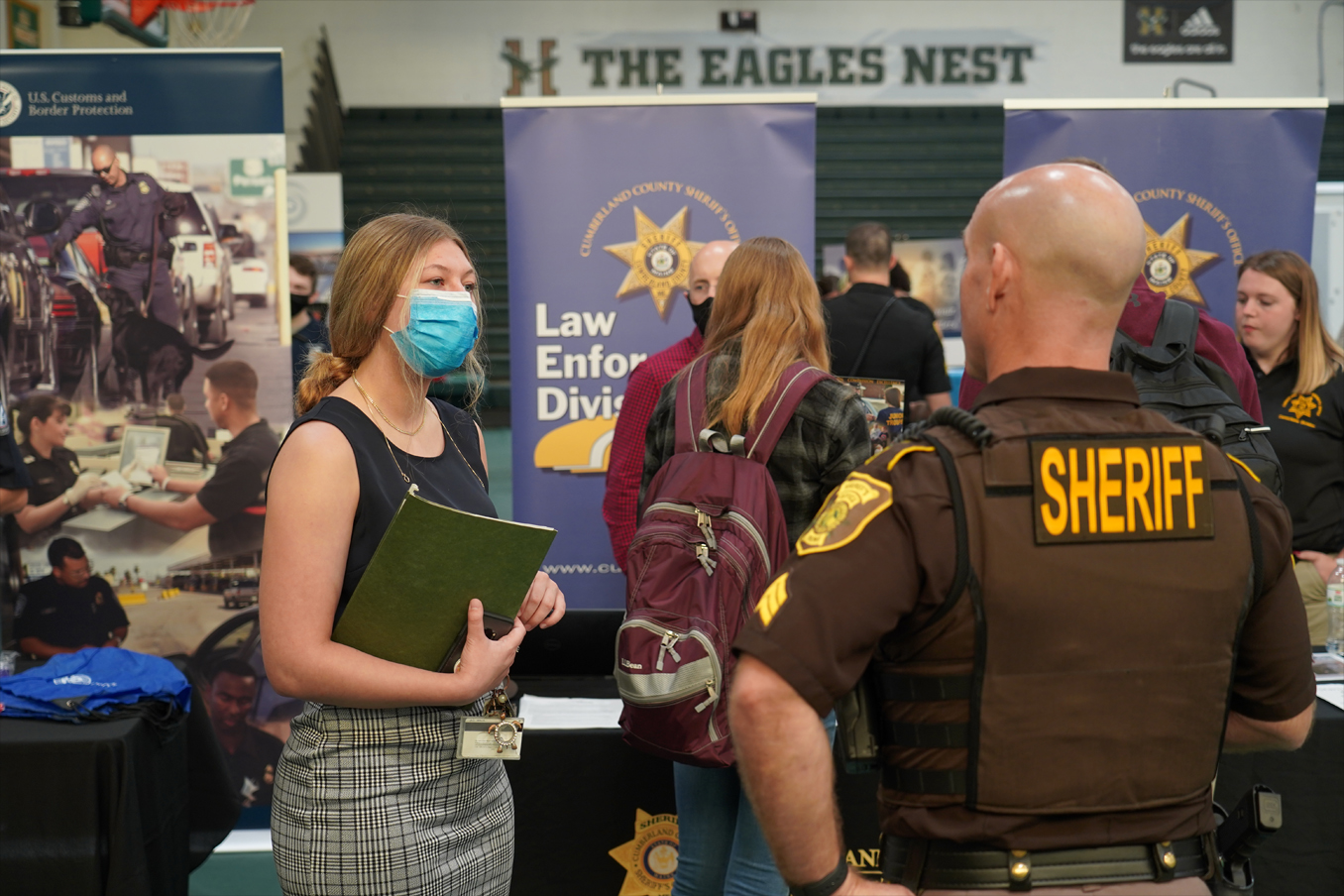 A student attends the Legal Studies Career fair on campus of Husson University