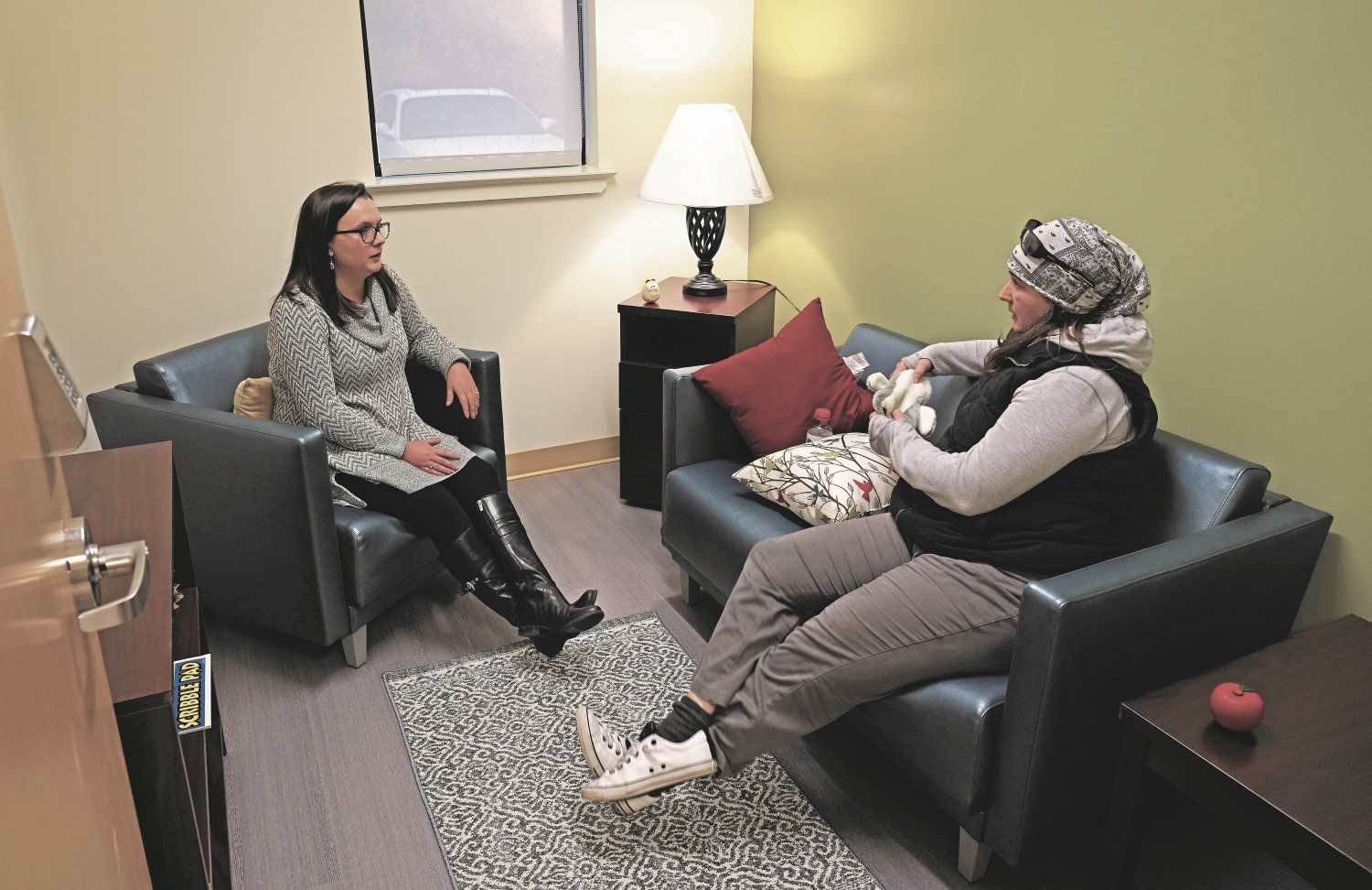 Two people participating in a counseling session