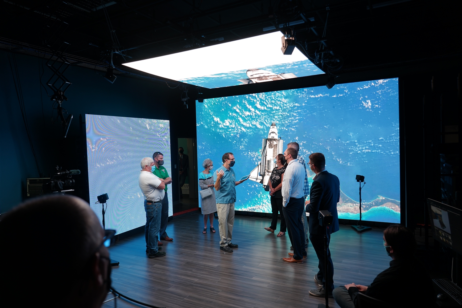 people standing in extended reality studio