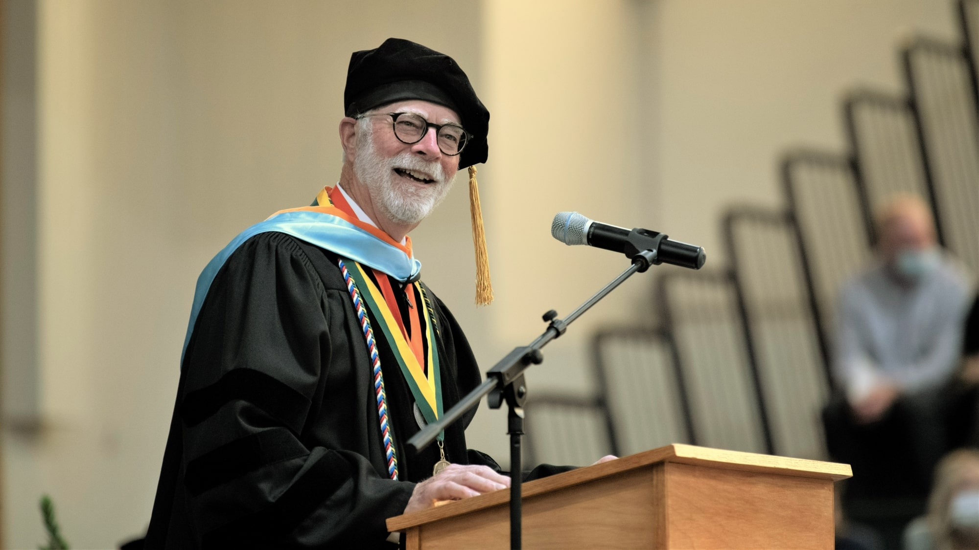 john rohman dressed in graduation attire