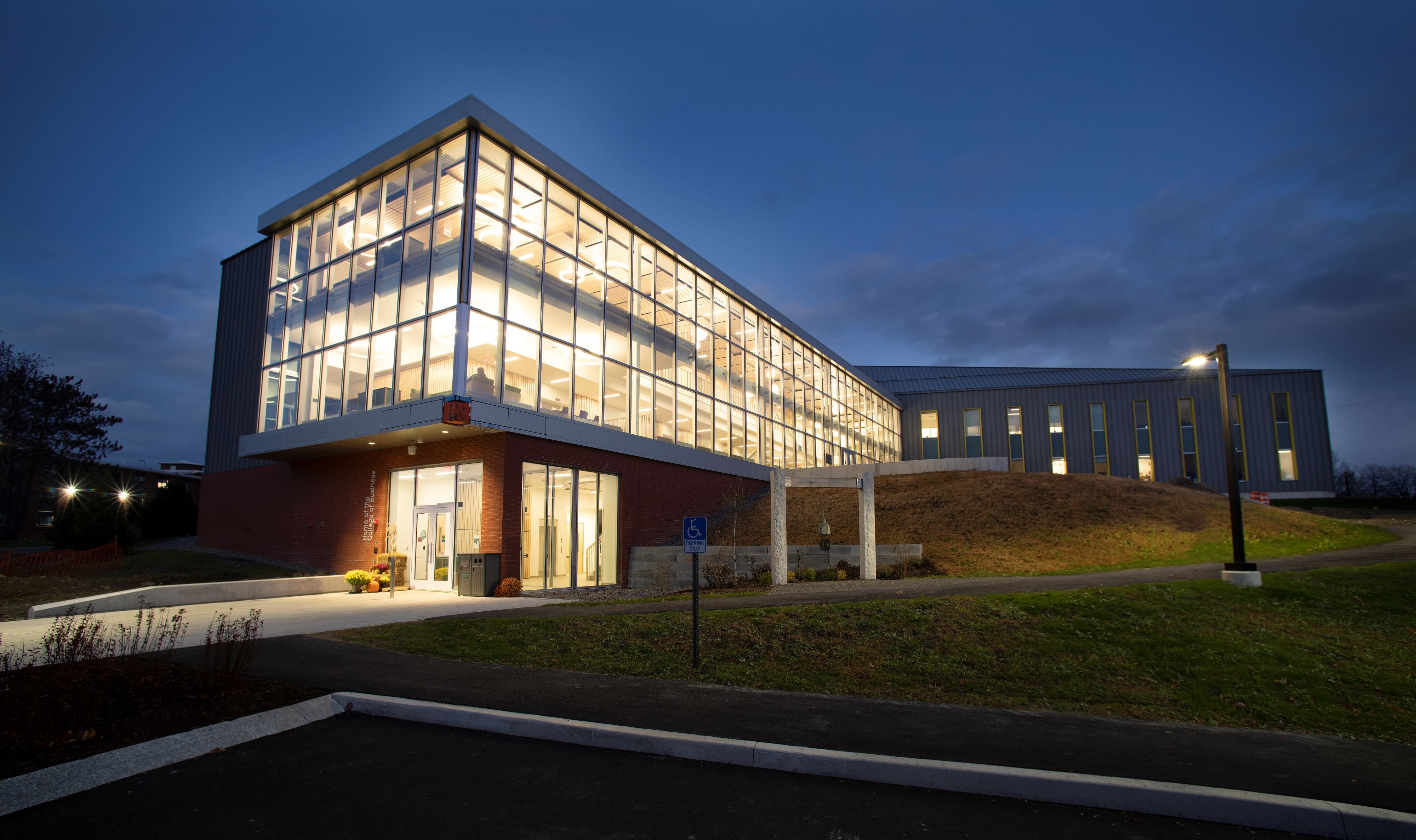 Exterior of Harold Alfond Hall at night