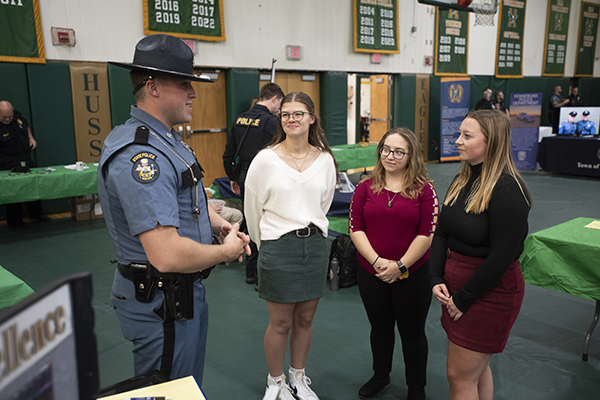 Students attend a career fair in the Newman Gymnasium