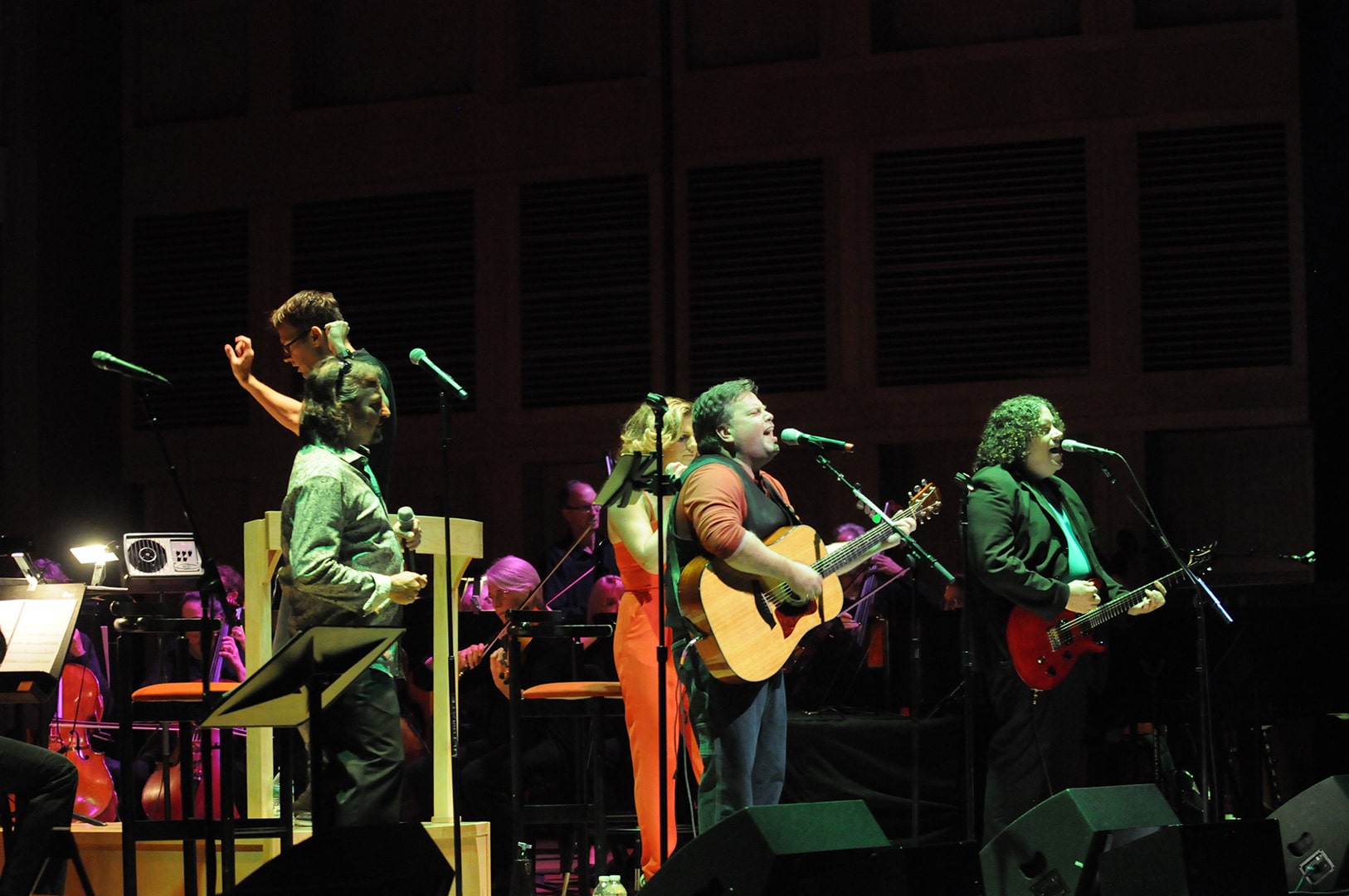 The Classic Rock Orchestra performs on stage.