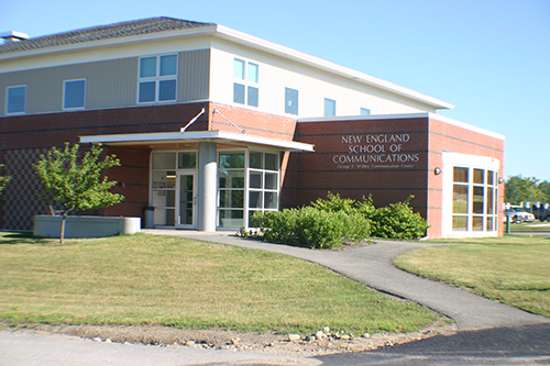 The Wildey Communications Center building is shown in this photo. It is a brick building.