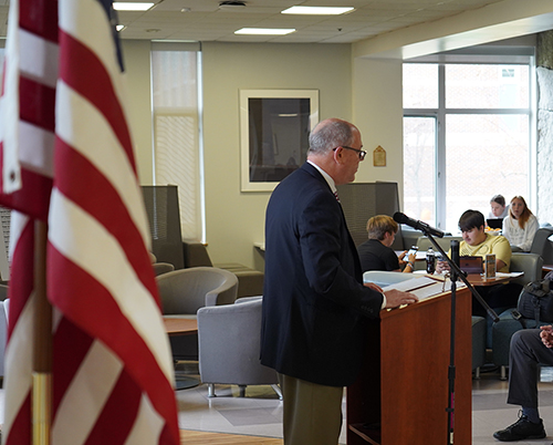 Scott Oxley ‘89, president of the Galen Cole Family Foundation, is shown speaking at a podium.