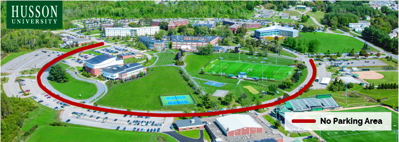 A visual of Husson's campus is shown with a red line on College Circle, indicating where parking is no longer allowed.
