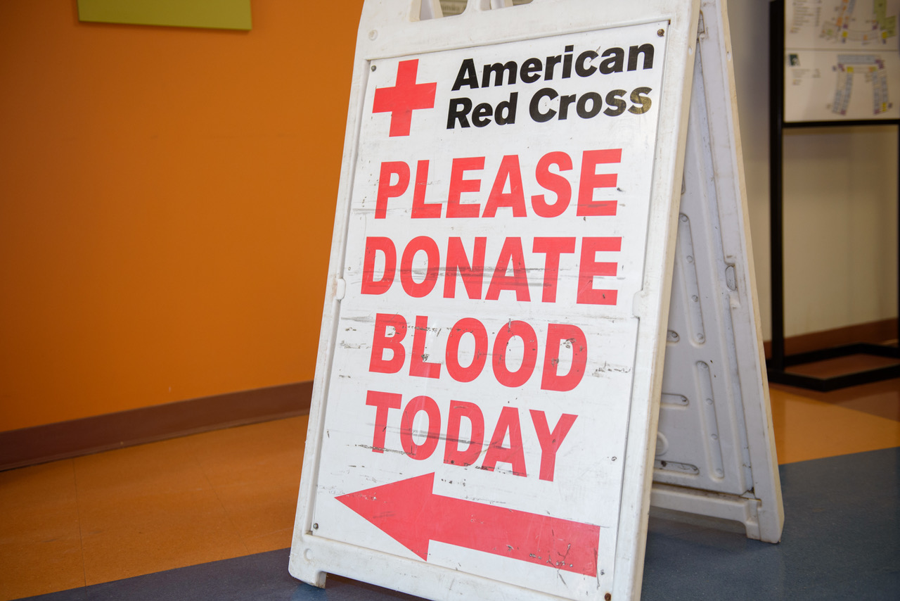 This photo shows a blood drive sign indicating that a blood drive is happening today.