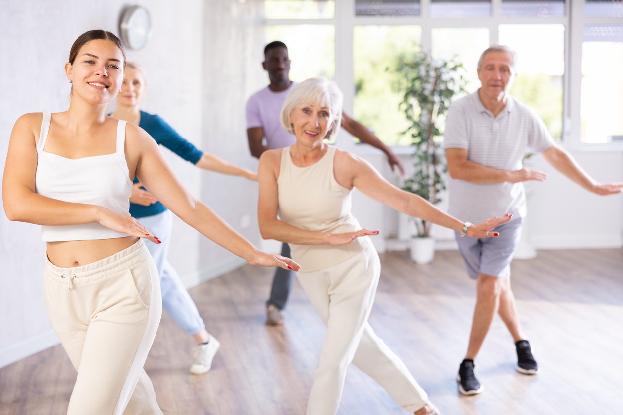 People dancing in a dance studio.