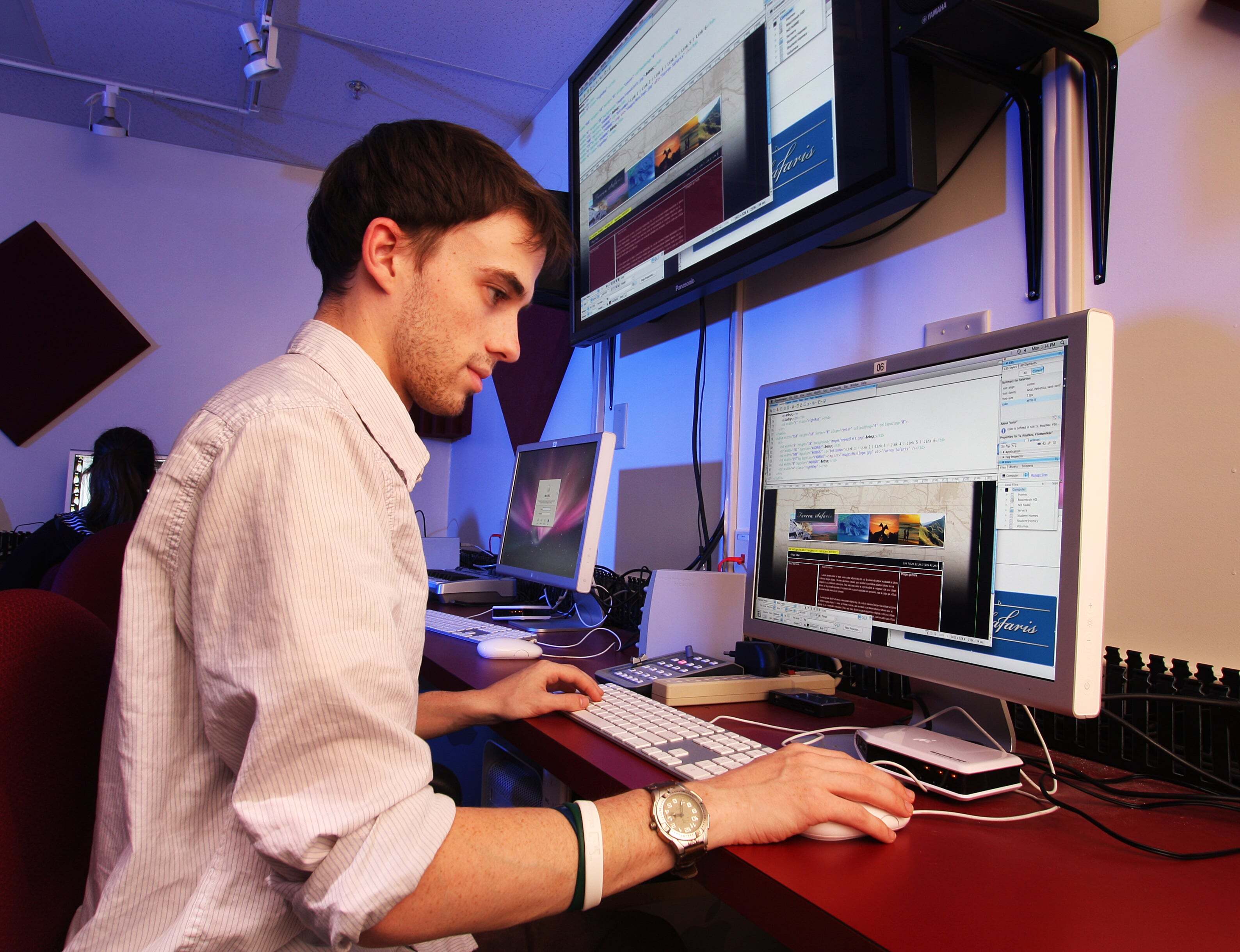 a student works at a desktop computer