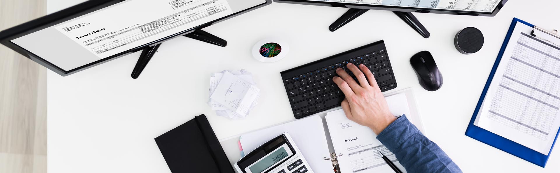 employee working on desktop computer