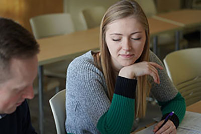 student sitting at a desk