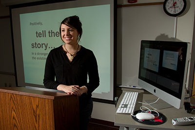 person giving a presentation on a projector screen