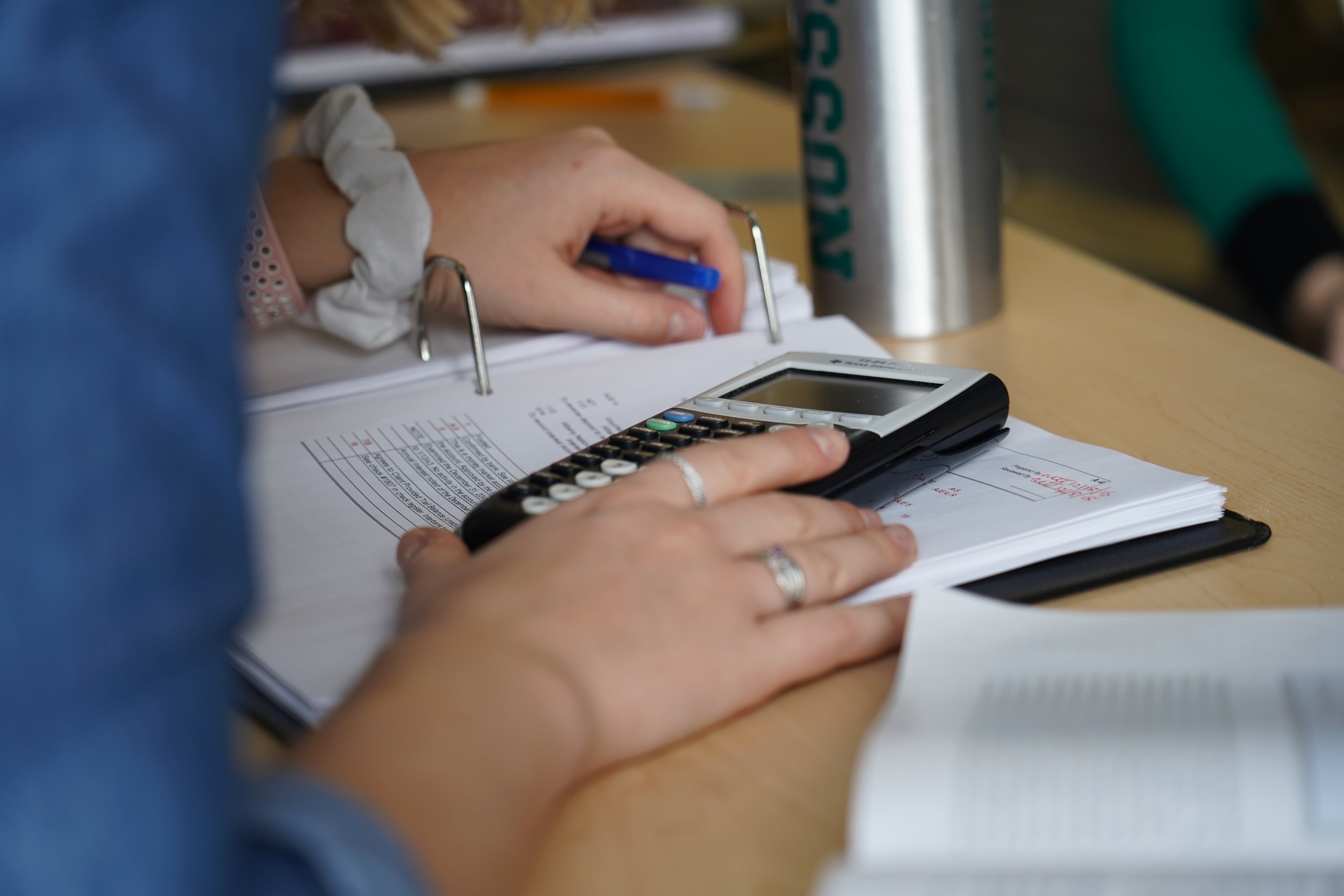 Student using a calculator