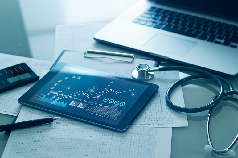 computers and medical equipment on a table