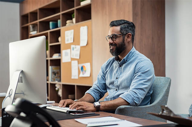 man working at a computer