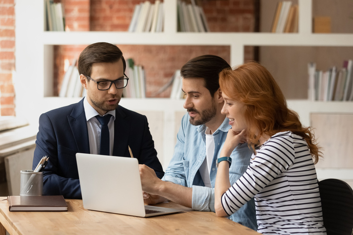 Accountant discussing finances with a couple