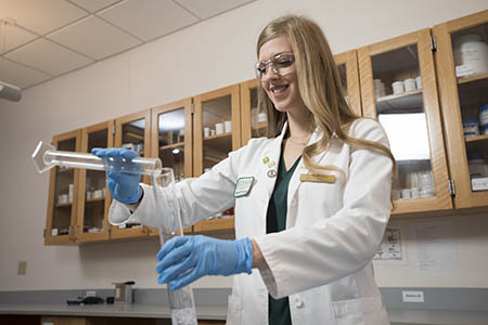School of Pharmacy student working in compounding lab