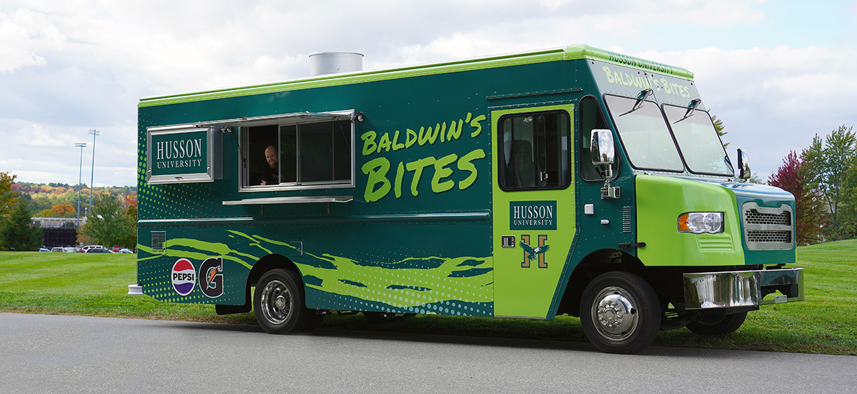 Baldwin's Bites food truck parked on the side of the road