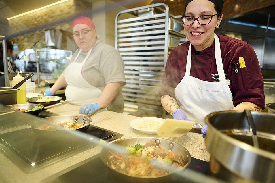 Dining staff prepare a meal in the Dickerman Dining Center