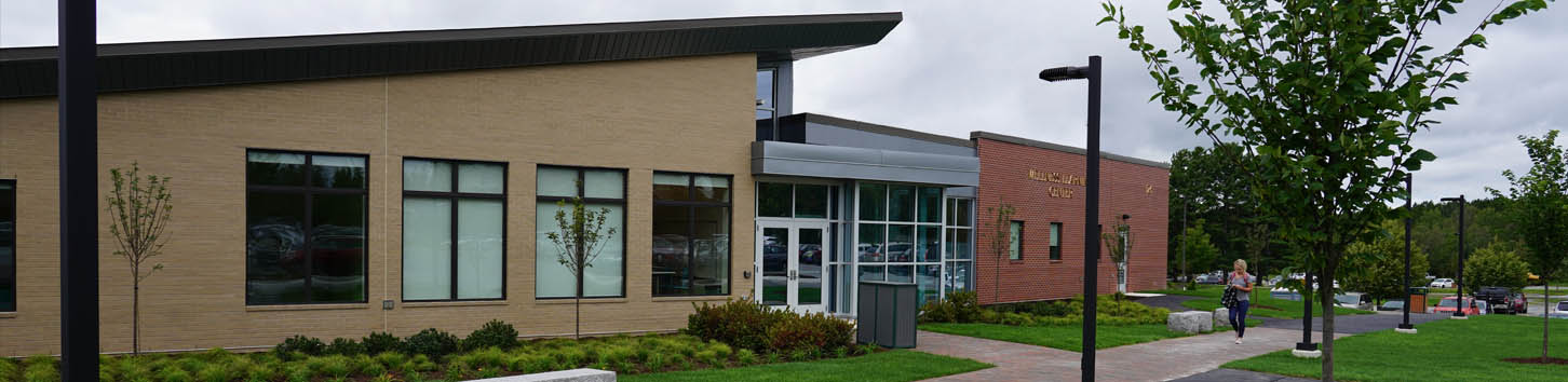 Students walking on campus of Husson University